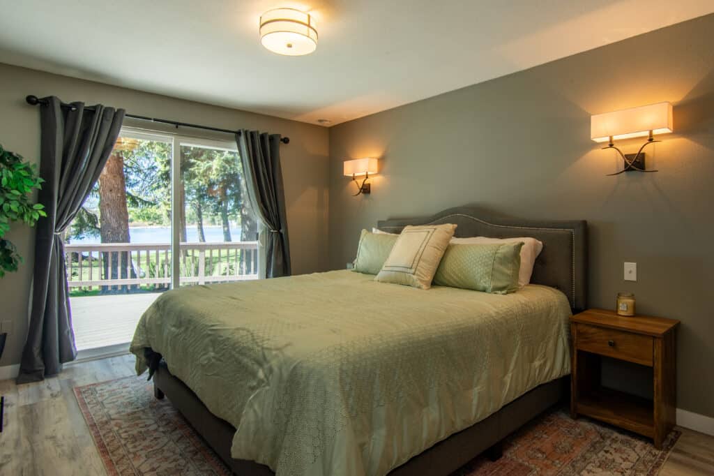 The bedroom in the Gold Cabin at Historic Gilchrist Waterfront Resort, our cabins in Oregon on the lake.